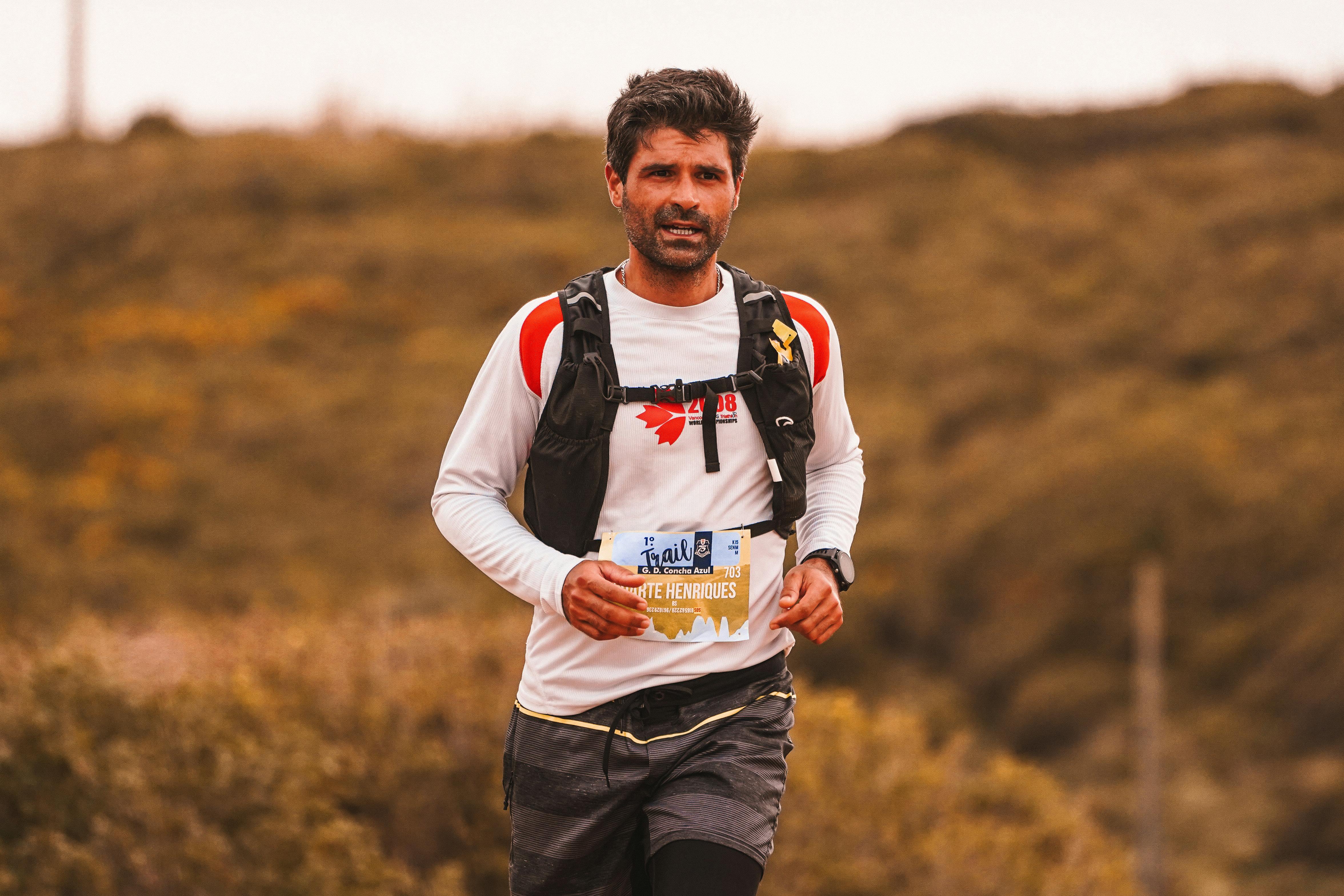 Trail runner competing in an outdoor marathon event