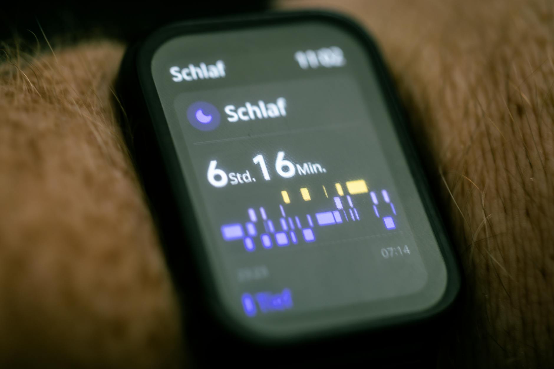 Smartwatch sleep-tracking display used as an illustration for consumer sleep data.