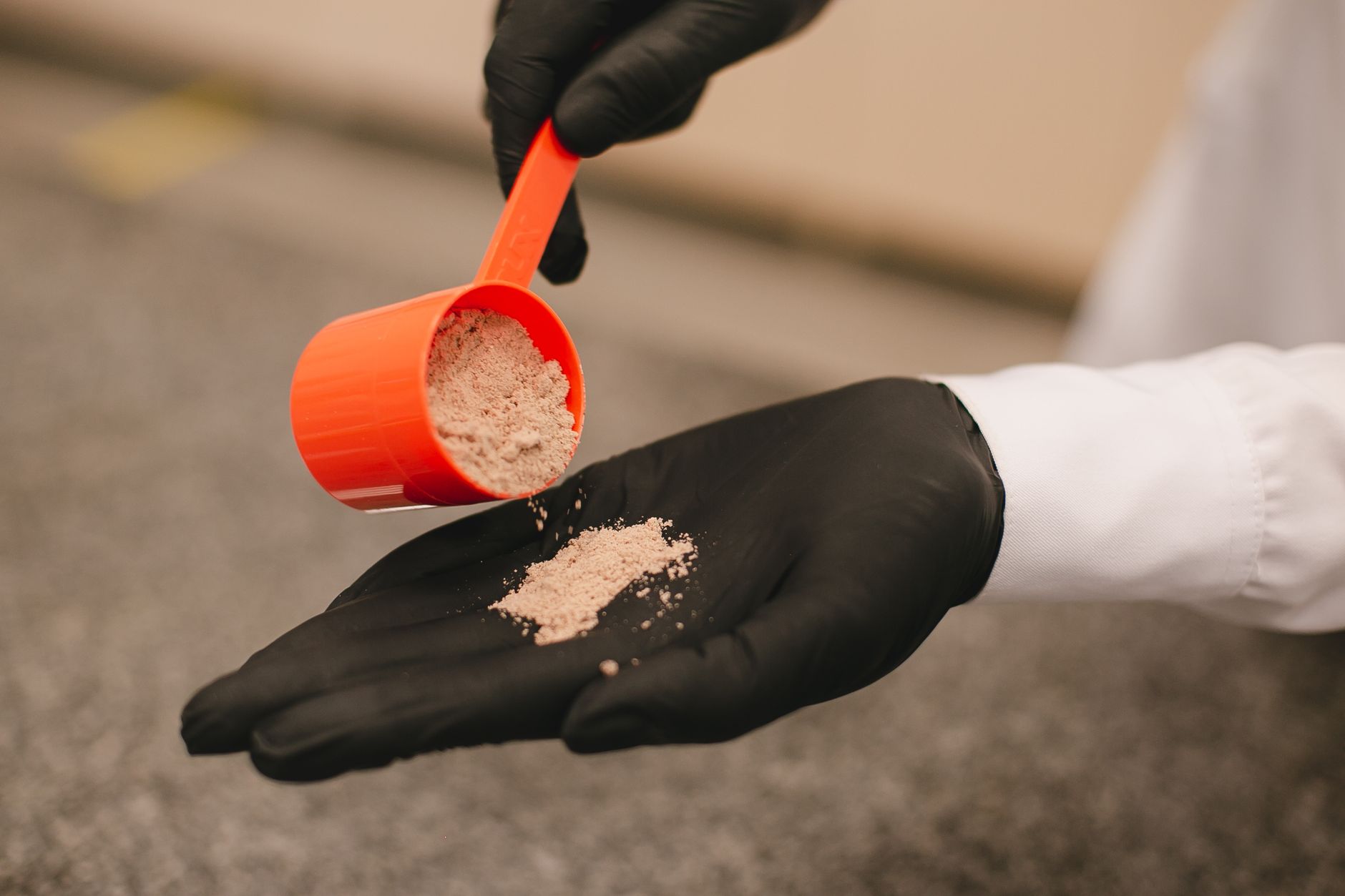 Creatine supplement powder in a laboratory setting